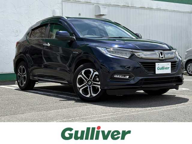 ホンダ ヴェゼル ハイブリッド Z ホンダセンシング 徳島県 2018(平30)年 2.6万km ミッドナイトブルービームM 純正SDナビ　VXM-195VFi/　BT/DISC/AM/FM/HDMI/フルセグ/ドライブレコーダー　DRV-410/バックカメラ/ビルトインETC/オートブレーキホールド/ワイパーデアイサー/パドルシフト/フォグライト/SPORT　MODE/追従式クルーズコントロール/ハーフレザーシート/前席シートヒーター/前席エアーシート/ドアバイザー/E CON/近距離衝突軽減ブレーキ