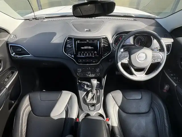 クライスラー・ジープ ジープ チェロキー リミテッド 石川県 2020(令2)年 6万km 白 4WD/純正メモリナビ/　Bluetooth・AM/FM・USB・AUX/フルセグTV/ETC2.0/バックカメラ/前後ドライブレコーダー/アダプティブクルーズコントロール/ルーフレール/パワーシート（D+N席）/シートメモリー/シートヒーター（D＋N席）/エアシート（D＋N席）/パワーバックドア/パドルシフト/ブラインドスポットモニター/アンチロック・ブレーキ・システム/衝突被害軽減システム/横滑り防止装置/前後コーナーセンサー/レーンキープアシスト/盗難防止装置/パーキングアシスト/アイドリングストップ/エアバッグ（W+サイド）/カーテンエアバッグ/LEDヘッドライト/純正アルミホイール/スマートキー/スペアキー×1
