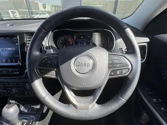クライスラー・ジープ ジープ チェロキー リミテッド 石川県 2020(令2)年 6万km 白 4WD/純正メモリナビ/　Bluetooth・AM/FM・USB・AUX/フルセグTV/ETC2.0/バックカメラ/前後ドライブレコーダー/アダプティブクルーズコントロール/ルーフレール/パワーシート（D+N席）/シートメモリー/シートヒーター（D＋N席）/エアシート（D＋N席）/パワーバックドア/パドルシフト/ブラインドスポットモニター/アンチロック・ブレーキ・システム/衝突被害軽減システム/横滑り防止装置/前後コーナーセンサー/レーンキープアシスト/盗難防止装置/パーキングアシスト/アイドリングストップ/エアバッグ（W+サイド）/カーテンエアバッグ/LEDヘッドライト/純正アルミホイール/スマートキー/スペアキー×1
