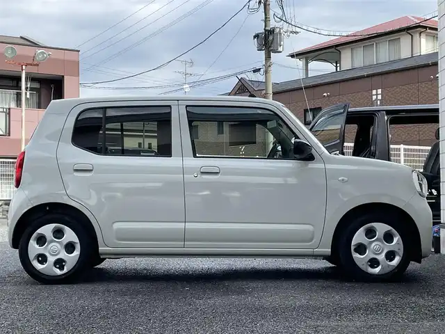 スズキ アルト L 福岡県 2023(令5)年 2.4万km ソフトベージュメタリック ワンオーナー/純正ディスプレイオーディオ/　（AM/FM/Bluetooth）/バックカメラ/スズキセーフティサポート/・誤発進抑制機能/・車線逸脱警報機能/・ふらつき警報機能/・先行車発進お知らせ機能/・後退時ブレーキサポート/・後方誤発進抑制機能/・リアパーキングセンサー/アイドリングストップ/横滑り防止装置/オートライト/純正ホイールキャップ/シートヒーター（D/N）/ETC/前後ドライブレコーダー【CTJ-880】/純正フロアマット/電格ミラー/ISOFIX/電源ソケット×1/USB端子×1/スペアキー×1/保証書/取扱説明書/ナビ取扱説明書