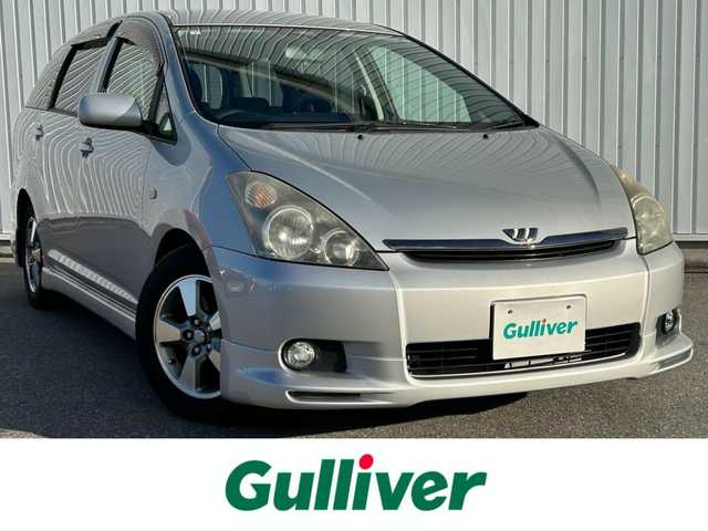 トヨタ ウィッシュ X Sパッケージ 滋賀県 2003(平15)年 17.6万km シルバーマイカM 社外HDDナビ/・AM/FM/・CD/DVD/・HDD/・Bluetooth/・フルセグTV/バックカメラ/ETC/オートマチックヘッドライト/HIDヘッドライト/フォグランプ/電動格納ミラー/シートリフター/純正15インチアルミホイール