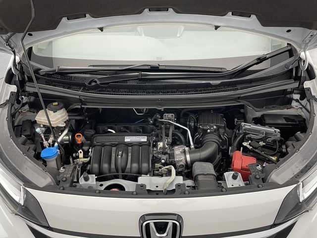ホンダ フリード ハイブリット G ホンダセンシング 長野県 2021(令3)年 4.8万km プラチナホワイトパール 純正メモリナビ/Bluetooth/CD/DVD/フルセグTV/バックカメラ/ETC/コーナーセンサー/両側パワスラ/ステアリングスイッチ/先行車発進お知らせ/路外逸脱抑制/標識認識表示/横滑り防止装置/衝突被害軽減システム/レーンキープアシスト/LEDヘッドライト/スマートキー/ドアバイザー/純正フロアマット