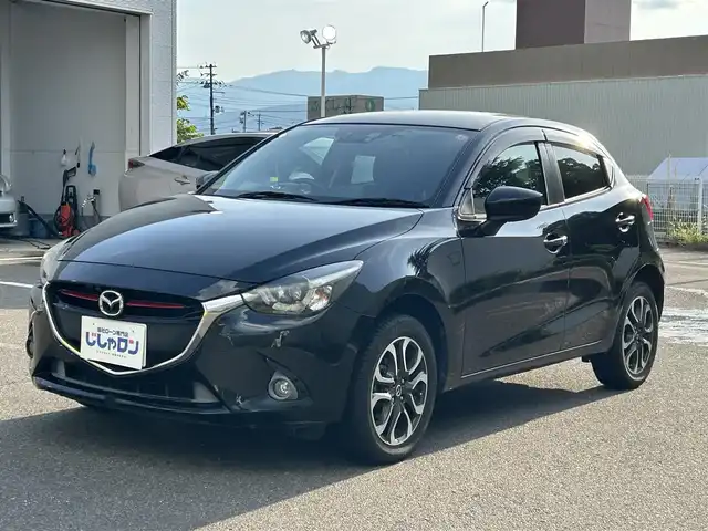 マツダ デミオ XD ツーリング 福島県 2015(平27)年 6.5万km ジェットブラックマイカ (株)IDOMが運営する【じしゃロン福島店】の自社ローン対象車両になります。こちらは現金ご利用時の価格です。自社ローンご希望の方は別途その旨お申付け下さい。/純正ナビ/バックカメラ/HUD/革巻きステアリング/クルーズコントロール/パドルシフト/フォグランプ/ドアバイザー/ステアリングリモコン/ドライブレコーダー/ウィンカーミラー/プッシュスタート/ETC