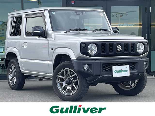 スズキ ジムニー XC 東京都 2020(令2)年 4.4万km シルキーシルバーメタリック 純正8インチナビ/（フルセグ/Bluetooth/CD/USB/ipod/AM/FM）/衝突軽減ブレーキ/レーンキープアシスト/クルーズコントロール/前席シートヒーター/バックカメラ/ビルトインETC/前後ドライブレコーダー/純正フロアマット/ヘッドライトウォッシャー/電格ミラー/フロントフォグランプ/ダウンヒルアシストコントロール/LEDヘッドライト/クルーズコントロール/新車保証書/ドアバイザー