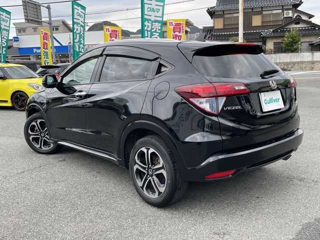 ホンダ ヴェゼル ハイブリッド Z ホンダセンシング 山口県 2017(平29)年 8.9万km クリスタルブラックパール 純正ナビ/DVD/CD/BT/USB/HDMI/フルセグTV/バックカメラ/ハーフレザーシート/前席シートヒーター/純正LEDヘッドライト/純正フォグランプ/オートライト/純正17インチアルミホイール/革巻きステアリング/ステアリングスイッチ/クルーズコントロール/パドルシフト/衝突被害軽減ブレーキ/LKA/横滑り防止/オートパーキングホールド/ルーフレール/スマートキー×２/ビルトインETC/ドライブレコーダー/純正フロアマット/純正ドアバイザー/電動格納ウインカードアミラー(オート機能付き)