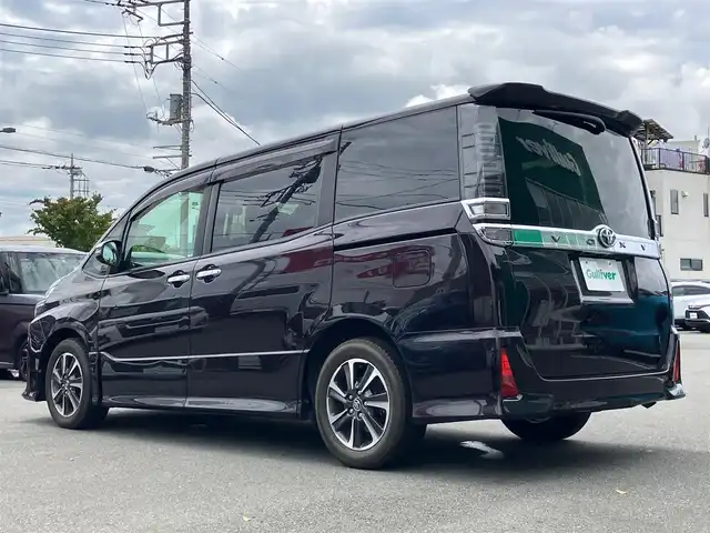 トヨタ ヴォクシー ZS 煌 静岡県 2017(平29)年 4.4万km ボルドーマイカメタリック エンジンスタートボタン/保証書/取扱説明書/記録簿/パワーステアリング/パワーウィンドウ/アイドリングストップ/スマートキー/Wオートエアコン/クルーズコントロール/ETC/USB入力端子/バックカメラ/純正SDナビ（CD.DVD.BT.フルセグ）/3列シート/ドライブレコーダー/ウォークスルー/両側パワースライドドア/純正アルミホイール/ABS/横滑り防止装置/レーンキープアシスト/オートライト/オートマチックハイビーム/Wエアバック/衝突軽減システム/合皮シートカバー