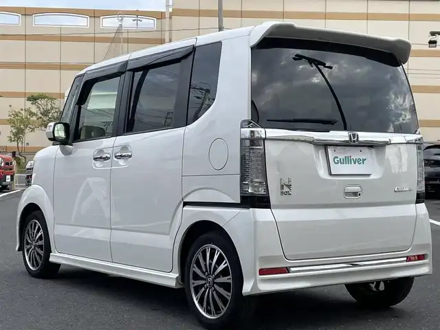 ホンダ Ｎ ＢＯＸ カスタム G ターボSSパッケージ 宮城県 2016(平28)年 5.2万km プレミアムホワイトパールⅡ 登録時走行距離52092km/カロッツェリアナビ/フルセグTV/両側パワースライドドア/バックカメラ/ビルトインETC/ルーズコントロール/衝突被害軽減ブレーキ/ターボ/HIDヘッドランプ/オートライト/オートエアコン/革巻きステアリング/ステアリングスイッチ/パドルシフト/ハーフレザーシート/前席シートヒーター/純正15インチアルミホイール/スマートキー/プッシュエンジンスイッチ/禁煙車