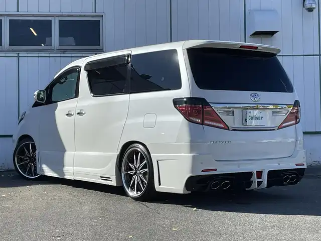 トヨタ アルファード 240S タイプゴールド 山梨県 2013(平25)年 11.5万km ホワイトパールクリスタルシャイン ALPINE製ナビ/ALPINE製フリップダウンモニター/CD/DVD/Bluetooth/SD/フルセグTV/バックカメラ/ETC/両側電動スライドドア/電動リアゲート/ステアリングスイッチ/クルーズコントロール/スペアキー/取扱説明書/保証書/社外マフラー/ローダウン/冬タイヤ純正ホイール付き車載（235/50/18）
