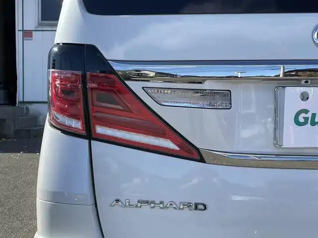 トヨタ アルファード 240S タイプゴールド 山梨県 2013(平25)年 11.5万km ホワイトパールクリスタルシャイン ALPINE製ナビ/ALPINE製フリップダウンモニター/CD/DVD/Bluetooth/SD/フルセグTV/バックカメラ/ETC/両側電動スライドドア/電動リアゲート/ステアリングスイッチ/クルーズコントロール/スペアキー/取扱説明書/保証書/社外マフラー/ローダウン/冬タイヤ純正ホイール付き車載（235/50/18）