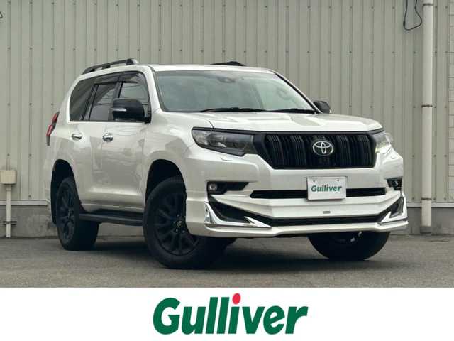 トヨタ ランドクルーザー プラド TX Lパッケージ マットブラED 山形県 2023(令5)年 2.5万km ホワイトパールクリスタルシャイン 4WD/衝突被害軽減システム/サンルーフ/モデリスタエアロ/純正メモリナビ/　　【CD DVD BT フルセグ USB】/全周囲カメラ/レーダークルーズコントロール/LEDオートライト/レザーシート/パワーシート/シートエアコン/シートヒーター/純正18インチアルミホイール/ドライブレコーダー/ステアリングスイッチ/MTモード付AT/電動格納ウィンカーミラー/フォグランプ/スマートキー/ETC2.0