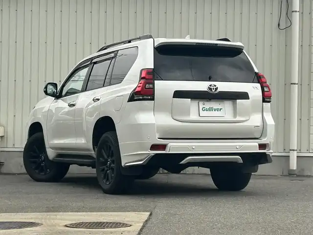 トヨタ ランドクルーザー プラド TX Lパッケージ マットブラED 山形県 2023(令5)年 2.5万km ホワイトパールクリスタルシャイン 4WD/衝突被害軽減システム/サンルーフ/モデリスタエアロ/純正メモリナビ/　　【CD DVD BT フルセグ USB】/全周囲カメラ/レーダークルーズコントロール/LEDオートライト/レザーシート/パワーシート/シートエアコン/シートヒーター/純正18インチアルミホイール/ドライブレコーダー/ステアリングスイッチ/MTモード付AT/電動格納ウィンカーミラー/フォグランプ/スマートキー/ETC2.0