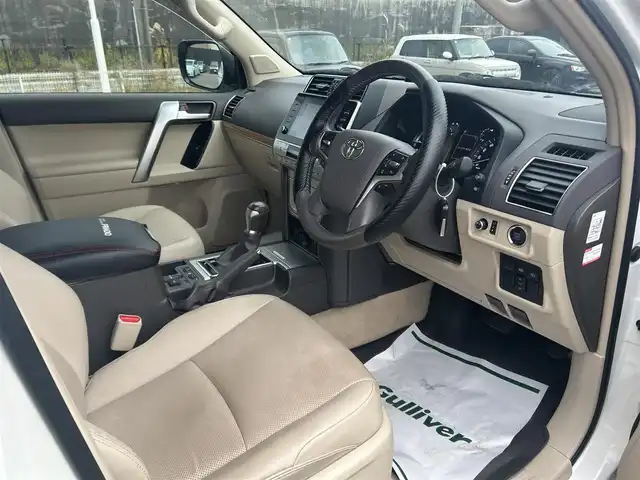 トヨタ ランドクルーザー プラド TX Lパッケージ マットブラED 山形県 2023(令5)年 2.5万km ホワイトパールクリスタルシャイン 4WD/衝突被害軽減システム/サンルーフ/モデリスタエアロ/純正メモリナビ/　　【CD DVD BT フルセグ USB】/全周囲カメラ/レーダークルーズコントロール/LEDオートライト/レザーシート/パワーシート/シートエアコン/シートヒーター/純正18インチアルミホイール/ドライブレコーダー/ステアリングスイッチ/MTモード付AT/電動格納ウィンカーミラー/フォグランプ/スマートキー/ETC2.0