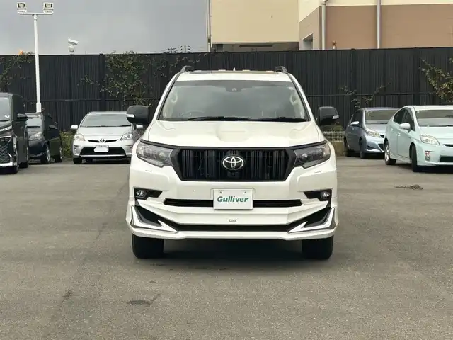 トヨタ ランドクルーザー プラド TX Lパッケージ マットブラED 山形県 2023(令5)年 2.5万km ホワイトパールクリスタルシャイン 4WD/衝突被害軽減システム/サンルーフ/モデリスタエアロ/純正メモリナビ/　　【CD DVD BT フルセグ USB】/全周囲カメラ/レーダークルーズコントロール/LEDオートライト/レザーシート/パワーシート/シートエアコン/シートヒーター/純正18インチアルミホイール/ドライブレコーダー/ステアリングスイッチ/MTモード付AT/電動格納ウィンカーミラー/フォグランプ/スマートキー/ETC2.0