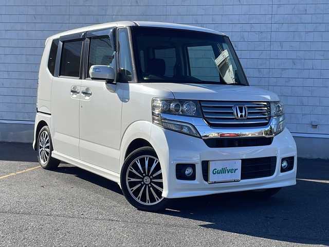 ホンダ Ｎ ＢＯＸ 茨城県 2013(平25)年 8.7万km プレミアムホワイトパール ステアリングスイッチ/クルーズコントロール/アイドリングストップ/バックカメラ/両側パワスラ/純正ナビ CD/DVD/BT/フルセグ　/LEDオートライト/横滑り防止装置/スマートキー/ETC