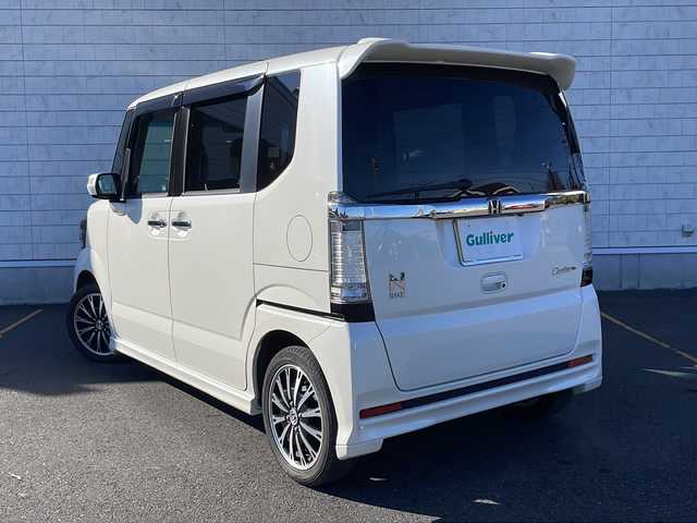 ホンダ Ｎ ＢＯＸ 茨城県 2013(平25)年 8.7万km プレミアムホワイトパール ステアリングスイッチ/クルーズコントロール/アイドリングストップ/バックカメラ/両側パワスラ/純正ナビ CD/DVD/BT/フルセグ　/LEDオートライト/横滑り防止装置/スマートキー/ETC