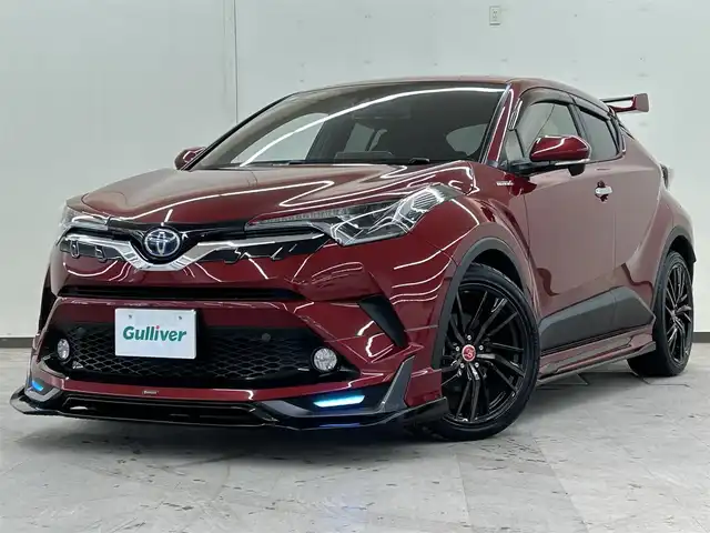 トヨタ Ｃ－ＨＲ S LEDエディション 道央・札幌 2018(平30)年 1万km センシュアルレッドマイカ ・社外SDナビ（DVD&CD&BT&フルセグ）/・ドアバイザー/・電動格納ミラー/・ウインカーミラー/・モデリスタフルエアロ/・社外マフラー/・社外AW/・ETC/・LEDヘッドライト/・フォグランプ/・プッシュスタート/・フォグランプ/・オートライト/・レーンキープアシスト/・純正AW冬タイヤ付き