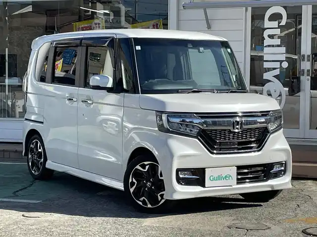 ホンダ Ｎ ＢＯＸ カスタム G L ターボ ホンダセンシング 神奈川県 2019(平31)年 6.8万km プラチナホワイトパール 純正メモリナビ/　（CD・DVD・Bluetooth）/フルセグTV/ホンダセンシング/両側パワースライドドア/ハンズフリースライドドア/アダプティブクルーズコントロール/LEDヘッドライト/ビルトインETC/前方ドライブレコーダー/パドルシフト/ハーフレザーシート/バックカメラ/スマートキー/取扱説明書