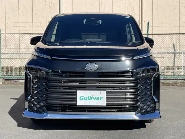 トヨタ ヴォクシー 東京都 2024(令6)年 3万km グリッターブラックガラスフレーク １０．５インチ純正ナビ　/Ｂｌｕｅｔｏｏｔｈ　/ＴＶ　/ＦＭ　/ＡＭ　/ＣＤ　/ＤＶＤ　/両側電動スライドドア　/追従型クルーズコントロールシステム　/シートヒーター　/ハーフレザーシート　/トヨタセーフティセンス/ABS/横滑り防止装置/コーナーセンサー/レーンアシスト/オートマチックハイビーム/衝突被害軽減システム