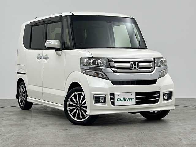 ホンダ Ｎ ＢＯＸ カスタム G ターボ Lパッケージ 三重県 2016(平28)年 6.4万km プレミアムホワイトパールⅡ 禁煙車/純正８型ナビ/（フルセグ・BT・DVD・USB・SD）/両側電動/Ｂカメラ/ビルトインＥＴＣ/クルコン　/ＣＴＢＡ/オートライト/ＨＩＤヘッド/ターボ/ステアリングリモコン/パドルシフト/プッシュスタート/スマートキー