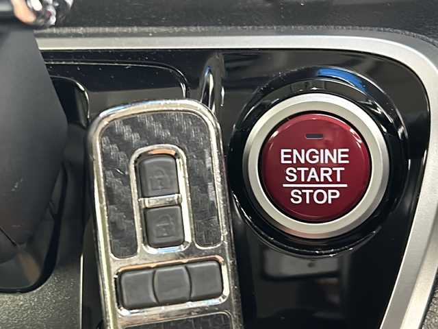ホンダ Ｎ ＢＯＸ カスタム G ターボ Lパッケージ 三重県 2016(平28)年 6.4万km プレミアムホワイトパールⅡ 禁煙車/純正８型ナビ/（フルセグ・BT・DVD・USB・SD）/両側電動/Ｂカメラ/ビルトインＥＴＣ/クルコン　/ＣＴＢＡ/オートライト/ＨＩＤヘッド/ターボ/ステアリングリモコン/パドルシフト/プッシュスタート/スマートキー