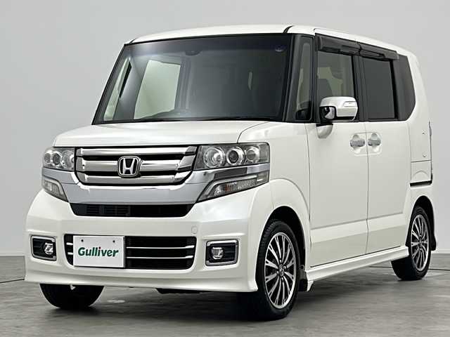 ホンダ Ｎ ＢＯＸ カスタム G ターボ Lパッケージ 三重県 2016(平28)年 6.4万km プレミアムホワイトパールⅡ 禁煙車/純正８型ナビ/（フルセグ・BT・DVD・USB・SD）/両側電動/Ｂカメラ/ビルトインＥＴＣ/クルコン　/ＣＴＢＡ/オートライト/ＨＩＤヘッド/ターボ/ステアリングリモコン/パドルシフト/プッシュスタート/スマートキー