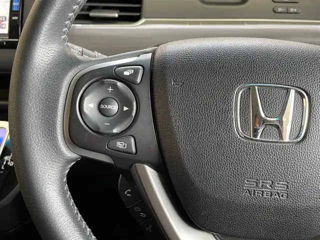 ホンダ フリード ハイブリット G ホンダセンシング 岩手県 2019(令1)年 7.7万km モダンスティールM ４WD/フリップダウンモニター/両側パワースライドドア/ホンダセンシング/衝突被害軽減システム/アダプティブクルーズコントロール/レーンアシスト/横滑り防止装置/アイドリングストップ/AC100V100Wコンセント/先行車発進お知らせ機能/熱線入りフロントウインドウ/ロールサンシェード/ウィークスルー/純正ナビ/（CD/DVD/フルセグ/USB/Bluetooth)/ステアリングスイッチ/バックカメラ/ETC/LEDヘッドライト/フォグランプ/エンジンスターター