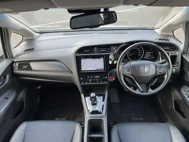ホンダ シャトル ハイブリッド Z ホンダセンシング 東京都 2020(令2)年 5.9万km プラチナホワイトパール 純正ナビ/バックモニター/衝突軽減ブレーキ/路外逸脱抑制機能/車線維持支援/パーキングセンサー/アダプティブクルーズコントロール/シートヒーター/ＥＴＣ/ドライブレコーダー/ステアリングスイッチ