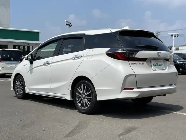 ホンダ シャトル ハイブリッド Z ホンダセンシング 東京都 2020(令2)年 5.9万km プラチナホワイトパール 純正ナビ/バックモニター/衝突軽減ブレーキ/路外逸脱抑制機能/車線維持支援/パーキングセンサー/アダプティブクルーズコントロール/シートヒーター/ＥＴＣ/ドライブレコーダー/ステアリングスイッチ