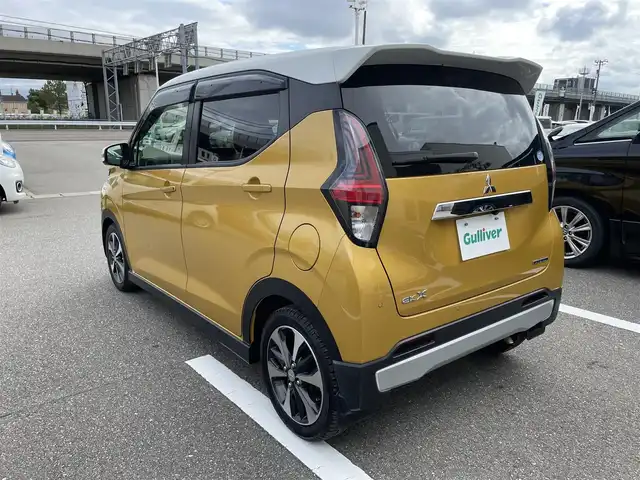 三菱 ｅＫクロス T 石川県 2020(令2)年 5.4万km 黄 純正9型ナビ/フルセグTV/アラウンドビューモニター/LEDヘッドライト/ETC/インテリキー/プッシュスタート/電動ミラー/デジタルミラー/レーンキープ/オートエアコン/保証書