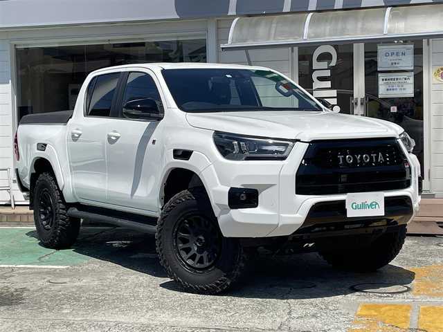 トヨタ ハイラックス Z GRスポーツ 神奈川県 2023(令5)年 0.8万km スーパーホワイトⅡ ワンオーナー/純正メモリナビ/　（Bluetooth・USB・Miracast）/BATTLEZマフラー/BATTLEZ車高調/デルタフォース17インチAW/ジオランダーサマータイヤ/プリクラッシュセーフティ/レーダークルーズコントロール/パノラミックビューモニター/運転席パワーシート/RICK’Sマッドフラップ/LEDヘッドライト/LEDフォグライト/ハードトノカバー/クリアランスソナー/ハーフレザーシート/前後ドライブレコーダー/ETC2.0/スマートキー×2/保証書/取扱説明書