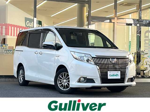 トヨタ エスクァイア ハイブリッド Gi 福島県 2015(平27)年 11万km ホワイトパールクリスタルシャイン 登録時走行距離：109/694km/メーカー純正SDナビ/（フルセグTV/AM/FM/BT接続/CD/DVD）/プッシュスタート/シートヒーター/純正フロアマット/クルコン/社外デジタルインナーミラー/バックカメラ/ドライブレコーダー前後方/純正サマータイヤ4本/ETC/HIDライト/ウィンカーミラー/フォグランプ/両側パワースライドドア/ステアリングスイッチ/レザーシート/革巻きハンドル/保証書/取扱説明書