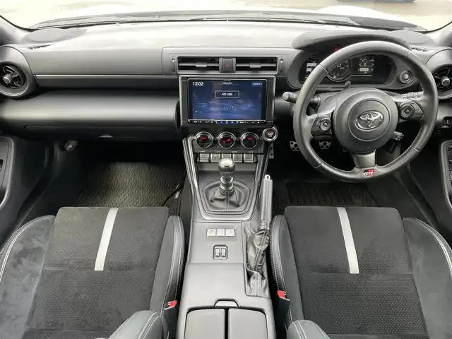 トヨタ ＧＲ８６ RZ 東京都 2022(令4)年 3.1万km クリスタルホワイトパール ＡＩＭＧＡＩＮ/・フロントカーボンスポイラー/・サイドカーボンスポイラー/GRトランクスポイラー/ＲＡＹＳホイール/ビルシュタイン車高調（ＫＷサスペンション）/HKS２本出しマフラー/ＡＬＰＩＮＥ９インチナビ（X9NXL）/バックカメラ/CD/DVD/BT/AM/FM/USB/HDMI/AppleCarplay/androidauto/ハーフレザーシート/シートヒーター/カロッツェリアウーファー（TS-WX140DA）/クルーズコントロール/LEDヘッドライト/ETC2.0/保証書・取説・スペアキー