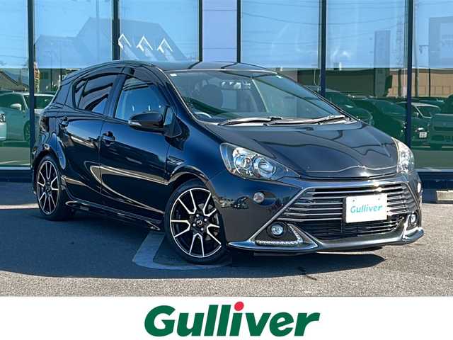 トヨタ アクア G G’s 岐阜県 2015(平27)年 9.3万km ブラックマイカ 登録時走行距離92224km/サイドエアロ/純正ナビ/フルセグＴＶ/バックカメラ/ハーフレザーシート/クルーズコントロール/純正アルミホイール/純正フロアマット/ビルトインＥＴＣ/プッシュスタート/スマートキー/ＬＥＤヘッドライト/オートライト/フロントフォグランプ/ドライブレコーダー/ドアバイザー/CDチェンジャー