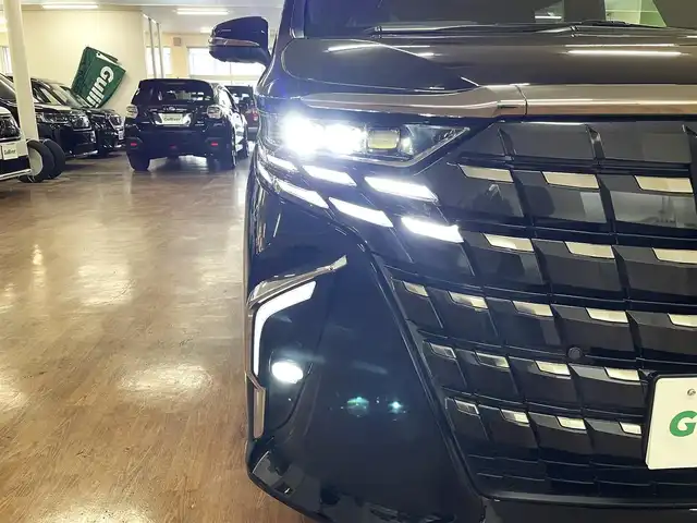トヨタ アルファードハイブリット Z 道央・札幌 2023(令5)年 1.4万km ブラック ワンオーナー/寒冷地仕様/Toyota Safety Sense/純正14インチディスプレイオーディオ/フルセグ/Applecarplay/Bluetooth/AndroidAuto/パノラミックビューモニター/13.2型後席ディスプレイ/両側パワースライドドア/パワーバックドア/ユニバーサルステップ/ステアリングヒーター/シートヒーター（運/助/2列目）/パワーシート（運/助/2列目）/エアシート（運/助/2列目）/ レーダークルズコントロール/ヘッドアップディスプレイ/シーケンシャルウィンカー/純正18インチAW/モデリスタクールシャインキット/モデリスタシグネチャーイルミブレード/置くだけ充電/ETC2.0/前後ドラレコ/スマートキー×2/社外17インチAW付スタッドレスセット積込み/保証書/取扱説明書