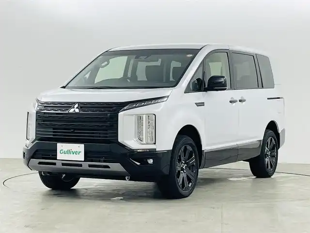 三菱 デリカＤ：５ シャモニー 福島県 2025(令7)年 0.1万km未満 ホワイトダイヤモンド ALPINEメモリーナビ/型番：EX11NX/【AM/FM/CD/DVD/BT/HDMI/USB/フルセグTV】/・バックカメラ/三菱e-Assist/・衝突被害軽減ブレーキシステム/・車線逸脱警報システム/・レーダークルーズコントロールシステム/・オートマチックハイビーム/・後側方車両検知警報システム/・誤発進抑制機能/パートタイム4WD/両側パワースライドドア/パワーバックドア/電子パーキング/・オートホールド/自動防眩ルームミラー/・全方位カメラ/・フロントカメラ/・サイドカメラ/アイドリングストップ/ハーフレザーシート/・両席シートヒーター/・運転席パワーシート/・後席チップアップシート/革巻きステアリング/・チルトステアリング/・ステアリングヒーター/・パドルシフト/・ステアリングスイッチ/プッシュスタート/・スマートキー/・スペアキー/LEDヘッドライト/・オートライト/・LEDフォグランプ/リアヒーターダクト/純正AW