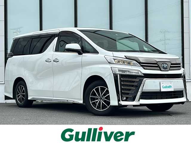 トヨタ ヴェルファイア ハイブリット ゴールデンアイズⅢ 山形県 2022(令4)年 6.4万km ホワイトパールクリスタルシャイン 4WD/衝突被害軽減システム/レーダークルーズコントロール/純正ナビ/（Bluetooth/CD/DVD/フルセグ)/サンルーフ/両側パワースライドドア/前後コーナーセンサー/フォグランプ/LEDヘッドライト/オートライト/オートマチックハイビーム/BSM/パーキングアシスト/車線逸脱装置/レーンキープアシスト/横滑り防止装置/アイドリングストップ/アラウンドビューモニター/JBLプレミアムサウンドシステム/フリップダウンモニター/ハーフレザーシート/100V充電/ビルトインETC2.0/純正AW＋サマータイヤ(5mm・R17)四本車載/電動格納ミラー/ウィンカーミラー/スマートキー/スペアキー/ドアバイザー