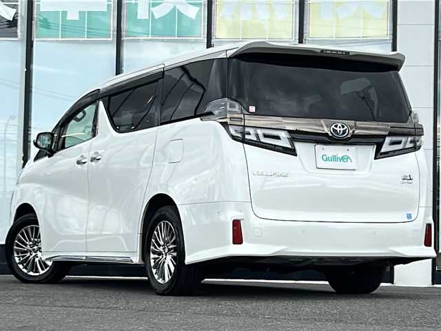 トヨタ ヴェルファイア ハイブリット ゴールデンアイズⅢ 山形県 2022(令4)年 6.4万km ホワイトパールクリスタルシャイン 4WD/衝突被害軽減システム/レーダークルーズコントロール/純正ナビ/（Bluetooth/CD/DVD/フルセグ)/サンルーフ/両側パワースライドドア/前後コーナーセンサー/フォグランプ/LEDヘッドライト/オートライト/オートマチックハイビーム/BSM/パーキングアシスト/車線逸脱装置/レーンキープアシスト/横滑り防止装置/アイドリングストップ/アラウンドビューモニター/JBLプレミアムサウンドシステム/フリップダウンモニター/ハーフレザーシート/100V充電/ビルトインETC2.0/社外AW＋サマータイヤ(2mm・R16)4本車載/電動格納ミラー/ウィンカーミラー/スマートキー/スペアキー/ドアバイザー