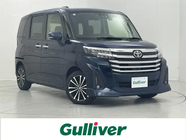 トヨタ ルーミー カスタムG－T 茨城県 2021(令3)年 3.6万km レーザーブルークリスタルシャイン 純正9型ナビ/全方位カメラ/フルセグ/純正フリップダウンモニター/衝突被害軽減ブレーキ/車線逸脱抑制装置/レーダークルーズコントロール/オートマチックハイビーム/クリアランスソナー/両側電動スライドドア/ETC/ドラレコ/シートヒーター/純正15インチAW/LEDヘッドライト/スマートキー