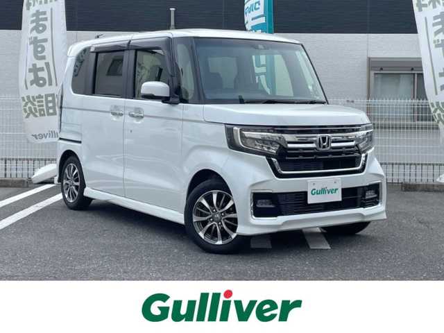 ホンダ Ｎ ＢＯＸ カスタム L 三重県 2021(令3)年 5.6万km プラチナホワイトパール 登録時55642km/社外ナビ/（AM/FM/TV/Bluetooth/AppleCarPlay/HDMI）/フルセグTV/バックカメラ/ETC/レーダークルーズコントロール/ステアリングスイッチ/オートライト/両側パワースライドドア/シートヒーター/衝突軽減システム/車線逸脱防止機能/コーナーセンサ/プッシュスタート/純正アルミ/純正フロアマット/スペアキー