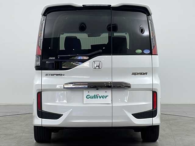 ホンダ ステップワゴン スパーダ クールスピリット 道央・札幌 2015(平27)年 4.4万km ホワイトオーキッドパール ・４WD＆ターボ/・寒冷地仕様/・純正ナビ（CD/DVD/BT/フルセグTV/USB）/・バックカメラ/・ハーフレザーシート/・前席シートヒーター/・ホンダセンシング/・両側パワースライドドア/・レーダークルーズコントロール/・パドルシフト/・ドアミラーヒーター/・LEDヘッドライト/・ステアリングスイッチ/・E T C/・社外ヘッドレストモニター/・コーナーセンサー/・アイドリングストップ/・社外AW付冬タイヤ積込