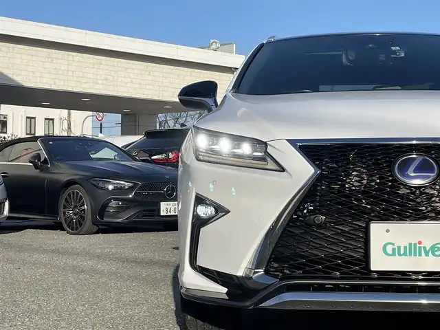 レクサス ＲＸ 450h Fスポーツ 兵庫県 2016(平28)年 5.2万km ホワイトノーヴァガラスフレーク /OP パノラマルーフ（チルト&アウタースライド式）//OP マークレビンソンプレミアムサウンド//OP パノラミックビューモニター//OP インテリジェントクリアランスソナー//OP RCTA//OP BSM//OP ルーフレール//OP 後席シートヒーター//OP 後席パワーシート（電動リクライニング/格納）//純正ナビ（12.3インチ）//地デジ/DVD/BT/USB/AUX//ステアリングリモコン（ステアリングヒーター付）//フルカラーヘッドアップディスプレイ//黒本革シート（電動/ヒーター/ベンチレーション）//3眼フルLEDヘッドランプ//シーケンシャルターンランプ//LEDフォグランプ//ビルトインETC//純正エンジンスターター//レーダークルーズコントロール//レーンキープアシスト//プリクラッシュセーフティ//オートマチックハイビーム