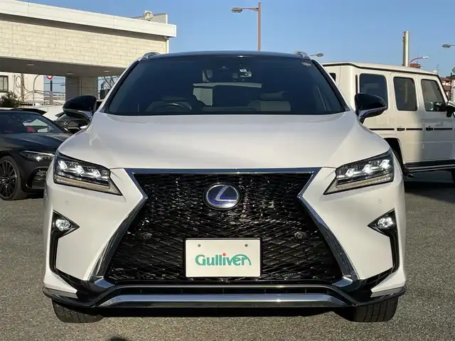 レクサス ＲＸ 450h Fスポーツ 兵庫県 2016(平28)年 5.2万km ホワイトノーヴァガラスフレーク /OP パノラマルーフ（チルト&アウタースライド式）//OP マークレビンソンプレミアムサウンド//OP パノラミックビューモニター//OP インテリジェントクリアランスソナー//OP RCTA//OP BSM//OP ルーフレール//OP 後席シートヒーター//OP 後席パワーシート（電動リクライニング/格納）//純正ナビ（12.3インチ）//地デジ/DVD/BT/USB/AUX//ステアリングリモコン（ステアリングヒーター付）//フルカラーヘッドアップディスプレイ//黒本革シート（電動/ヒーター/ベンチレーション）//3眼フルLEDヘッドランプ//シーケンシャルターンランプ//LEDフォグランプ//ビルトインETC//純正エンジンスターター//レーダークルーズコントロール//レーンキープアシスト//プリクラッシュセーフティ//オートマチックハイビーム