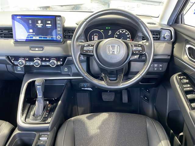 ホンダ ヴェゼル ハイブリッド e:HEV Z 富山県 2021(令3)年 4.5万km メテオロイドグレーメタリック 4WD/純正9インチプレミアムインターナビ/　フルセグ/CD/DVD/Bluetooth/パワーバックドア/ナビ連動前後ドライブレコーダー/レーダークルーズコントロール/純正18インチアルミホイール/D/N席シートヒーター/ハーフレザーシート/ステアリングヒーター/ホンダセンシング/パーキングソナー/バックカメラ/オートライト/ETC/スペアキー