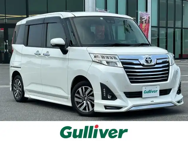 トヨタ ルーミー カスタムG 奈良県 2020(令2)年 4.7万km パールホワイトⅢ モデリスタエアロ/両側パワースライドドア/社外ディスプレイオーディオ(CD/DVD/AM・FM/BT)/ETC/前方ドラレコ/スマアシ/クルーズコントロール/衝突回避支援ブレーキ機能/ブレーキ制御付き誤発進抑制機能/車線逸脱警報機能/ふらつき警報/路側逸脱警報/純正14インチアルミホイール/LEDヘッドライト/本革巻きステアリング/後席サンシェード