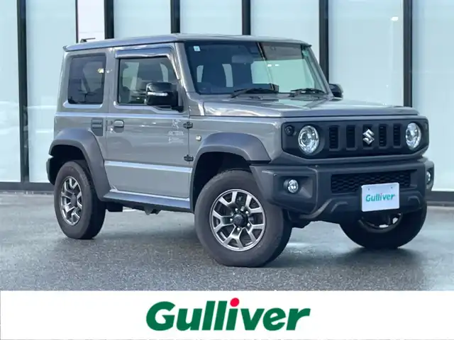 スズキ ジムニー シエラ JC 大阪府 2023(令5)年 2.3万km ミディアムグレー 純正ナビ　/ＥＴＣ　/シートヒーター　/前後ドライブレコーダー　/バックカメラ　/純正１５インチアルミホイール　/ＬＥＤヘッドランプ　/ヒーターミラー　/革巻ステアリング