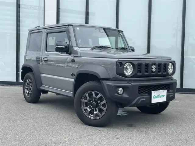 スズキ ジムニー シエラ JC 大阪府 2023(令5)年 2.3万km ミディアムグレー 純正ナビ　/ＥＴＣ　/シートヒーター　/前後ドライブレコーダー　/バックカメラ　/純正１５インチアルミホイール　/ＬＥＤヘッドランプ　/ヒーターミラー　/革巻ステアリング