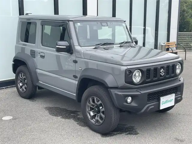 スズキ ジムニー シエラ JC 大阪府 2023(令5)年 2.3万km ミディアムグレー 純正ナビ　/ＥＴＣ　/シートヒーター　/前後ドライブレコーダー　/バックカメラ　/純正１５インチアルミホイール　/ＬＥＤヘッドランプ　/ヒーターミラー　/革巻ステアリング