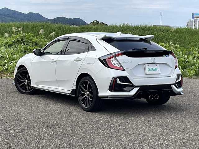 ホンダ シビック ハッチバック ホンダセンシング 新潟県 2021(令3)年 6.4万km プラチナホワイトパール 純正インターナビ(VXM-214VFi)/CD/DVD/BT/フルセグテレビ/SDミュージックサーバー/バックカメラ/ETC2.0/衝突被害軽減ブレーキ/レーンキープアシスト/レーダークルーズコントロール/半革シート/シートヒーター /パワーシート/ステアリングスイッチ/スマートキー/プッシュスタート/LEDヘッドライト/オートライト/オートハイビーム/フォグランプ/純正18インチアルミホイール