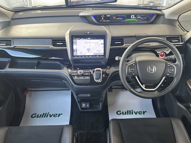 ホンダ フリード ハイブリット モデューロX 神奈川県 2023(令5)年 2.1万km クリスタルブラックパール 純正ナビ（CD/DVD/AM/FM/SD/BT/フルセグTV)/バックカメラ/前後ドライブレコーダー/レーダークルーズコントロール/ETC2.0/KYBサスペンション/両側パワースライドドア/レーンキープアシスト/横滑り防止装置/コーナーセンサー/プリクラッシュ/ハーフレザーシート/エンジンスタートボタン/オートライト/純正フロアマット/純正アルミホイール/スペアキー×１/保証書/取扱説明書