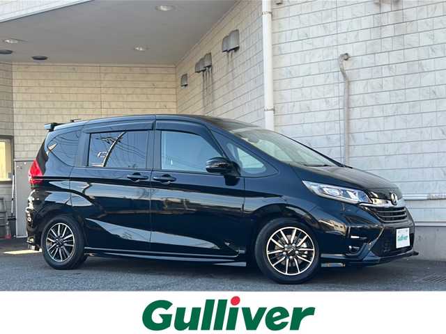 ホンダ フリード ハイブリット モデューロX 神奈川県 2023(令5)年 2.1万km クリスタルブラックパール 純正ナビ（CD/DVD/AM/FM/SD/BT/フルセグTV)/バックカメラ/前後ドライブレコーダー/レーダークルーズコントロール/ETC2.0/KYBサスペンション/両側パワースライドドア/レーンキープアシスト/横滑り防止装置/コーナーセンサー/プリクラッシュ/ハーフレザーシート/エンジンスタートボタン/オートライト/純正フロアマット/純正アルミホイール/スペアキー×１/保証書/取扱説明書